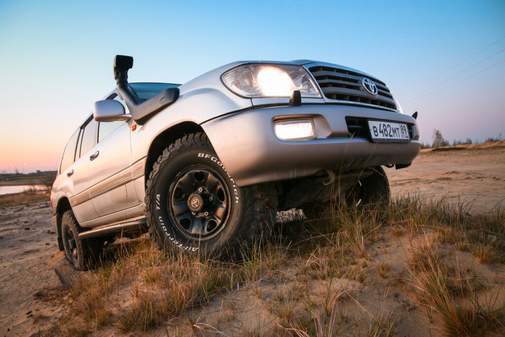 Novyy Urengoy, Russia - May 28, 2022: Offroad car Toyota Land Cruiser 100 at a countryside.