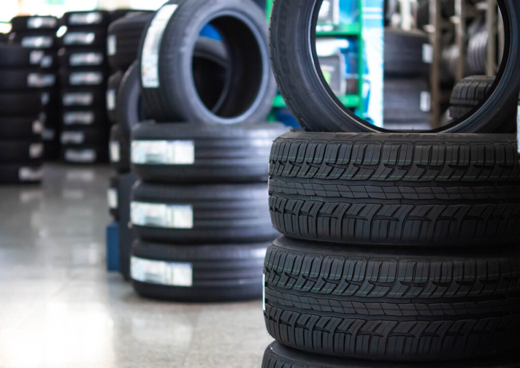 close up rubber tire and wheels at garage business shop object background